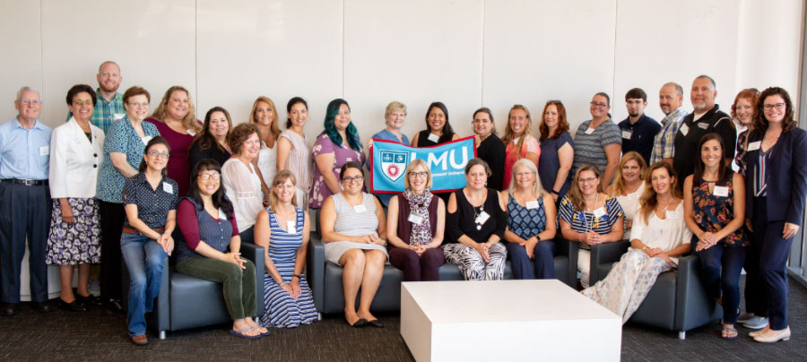 Group photo of faculty and staff affiliated with the Catholic School Administration program