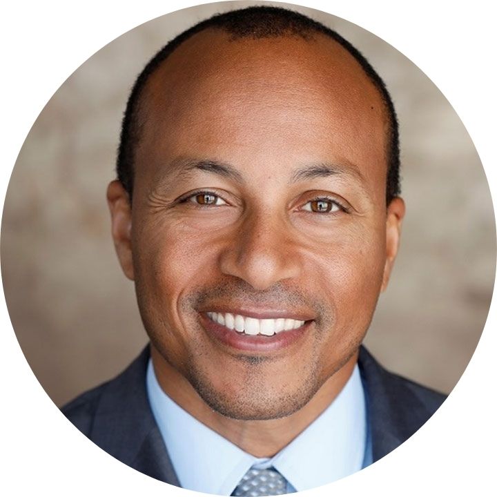 circular headshot of LMU alumnus Kadar Lewis