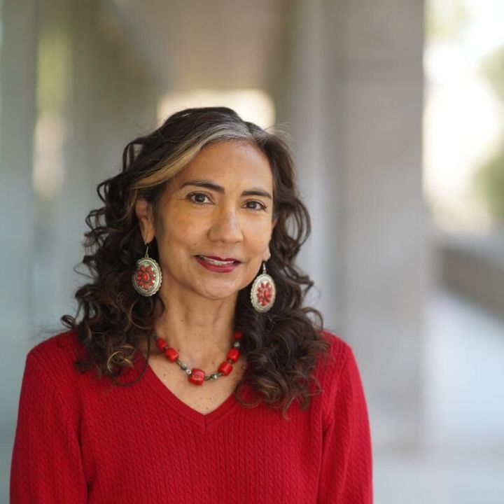 picture of woman wearing a red sweater