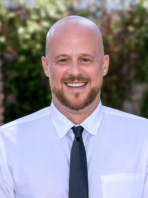 man wearing a white shirt and a tie