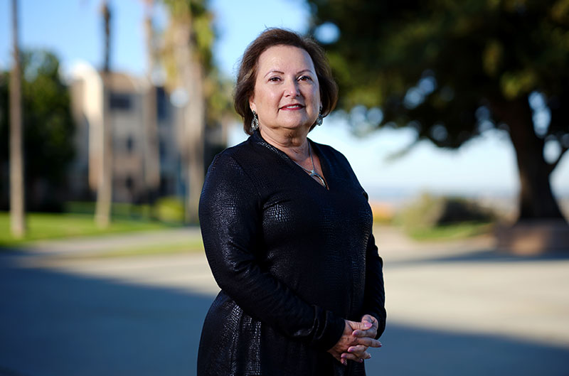 image of a woman standing on the bluff